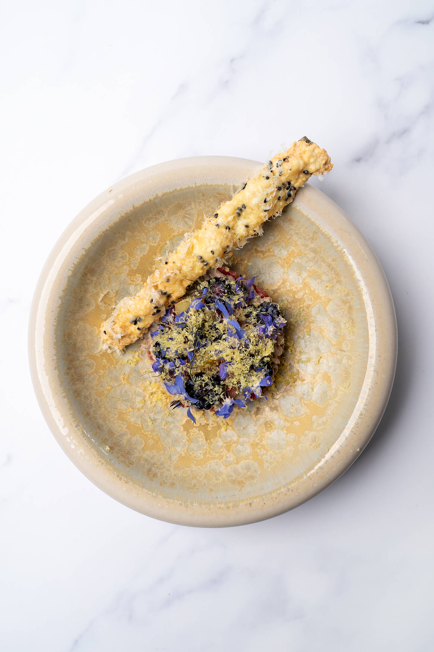 Grilled beef tartare with duck liver parfait and black berry dashi